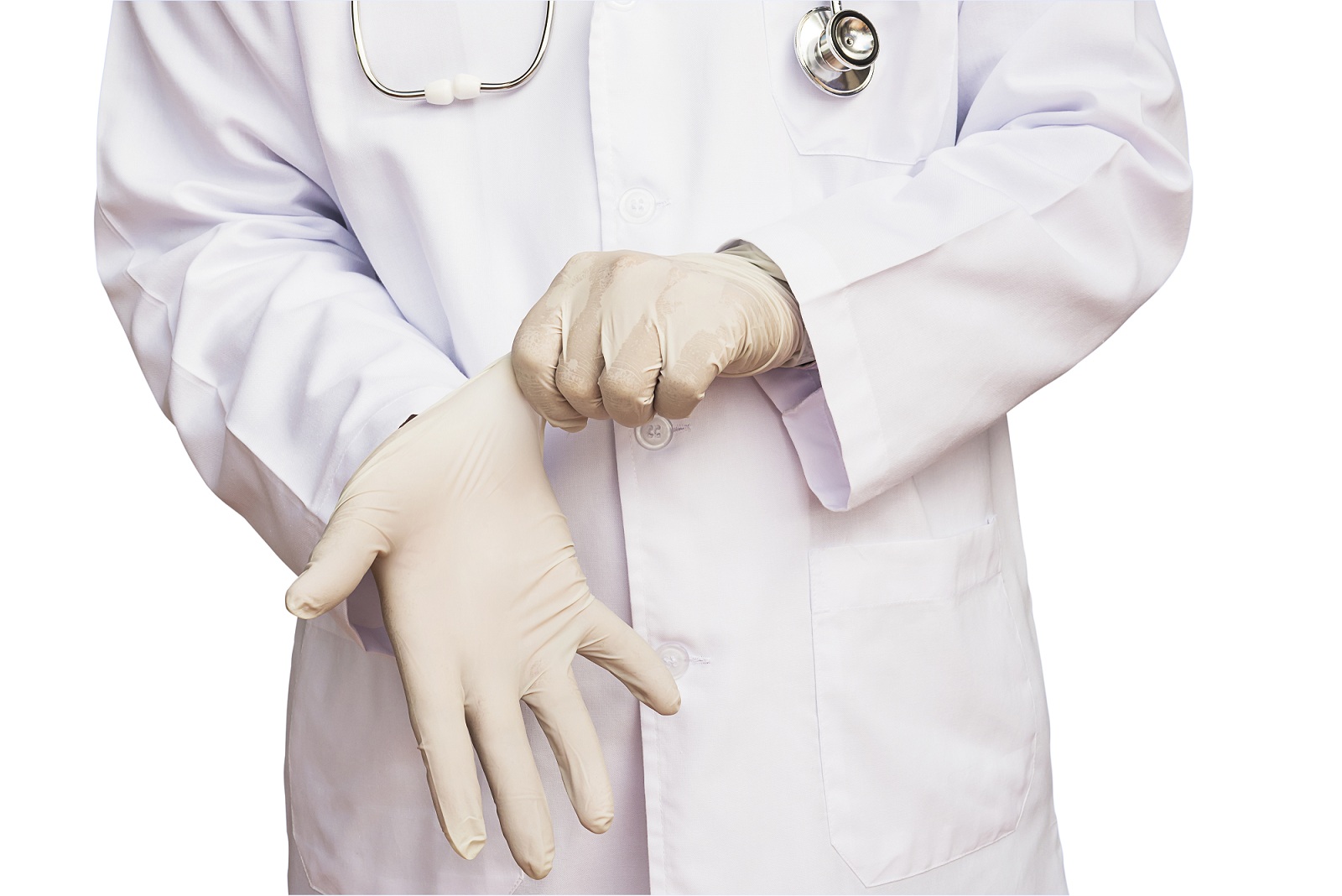 Lekarz mężczyzna zakładający rękawiczki aby zbadać sowjego pacjenta pytającego o hiperstymulację jajników